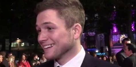 taron egerton tooth gap.